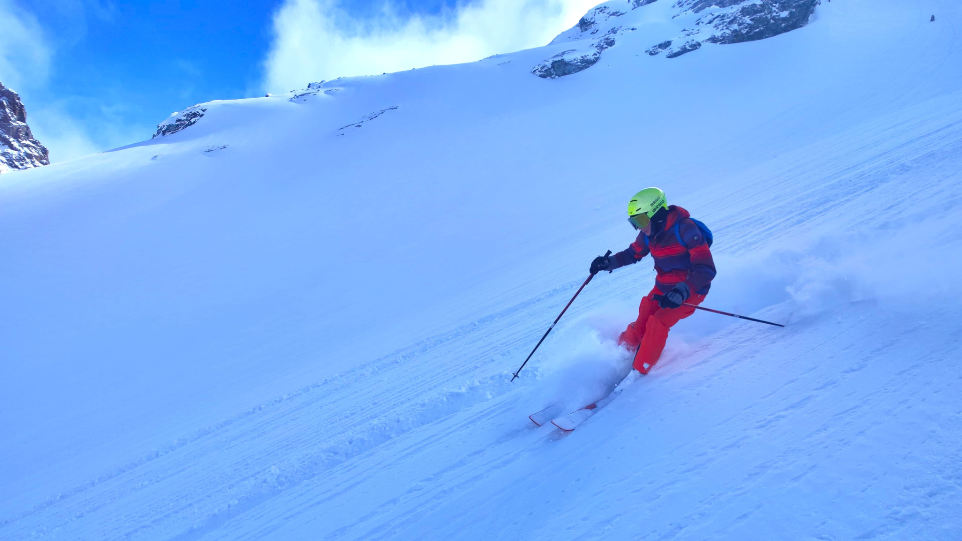 Elias Waagaard skiing downhill in the mountains